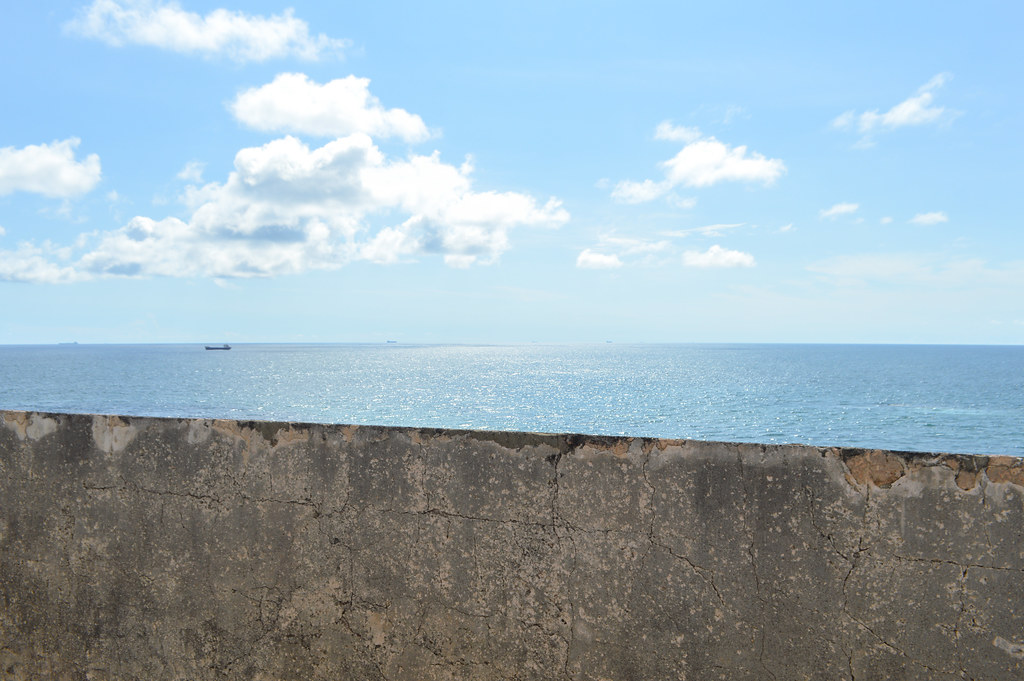 Sea glittering beyond the Fort rampart wall