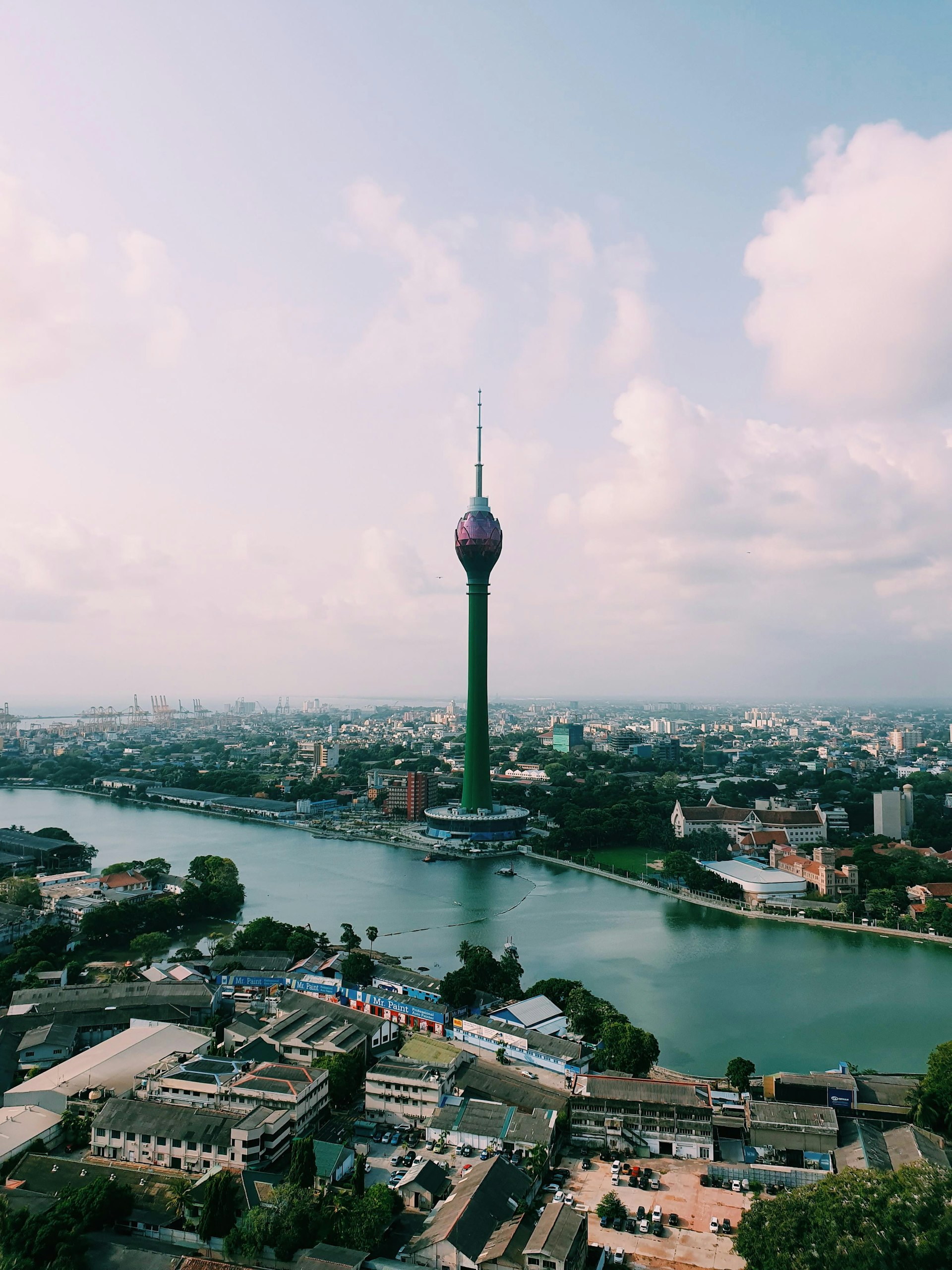 Green tower rising over the city