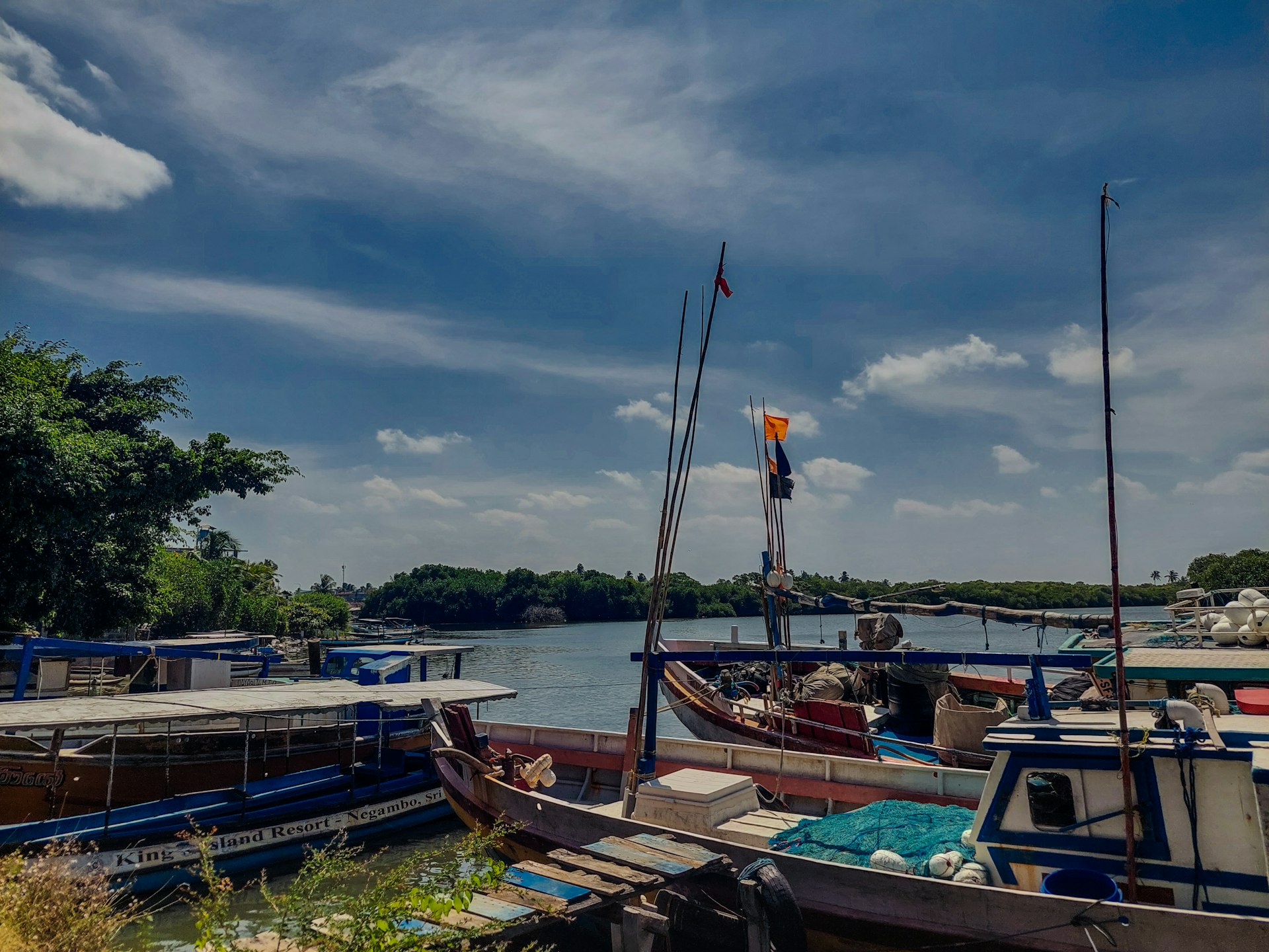Boats moored on a river