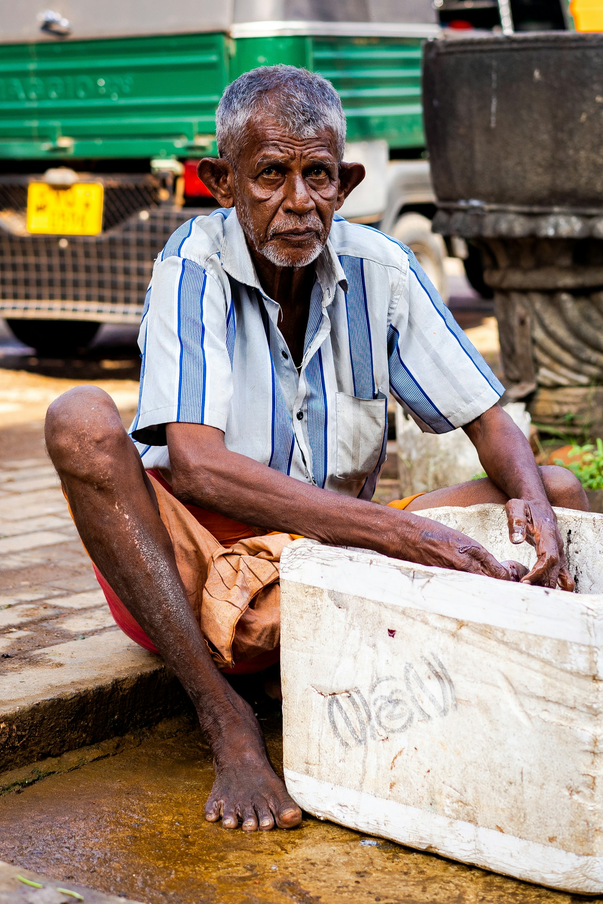 Man holding an ice box