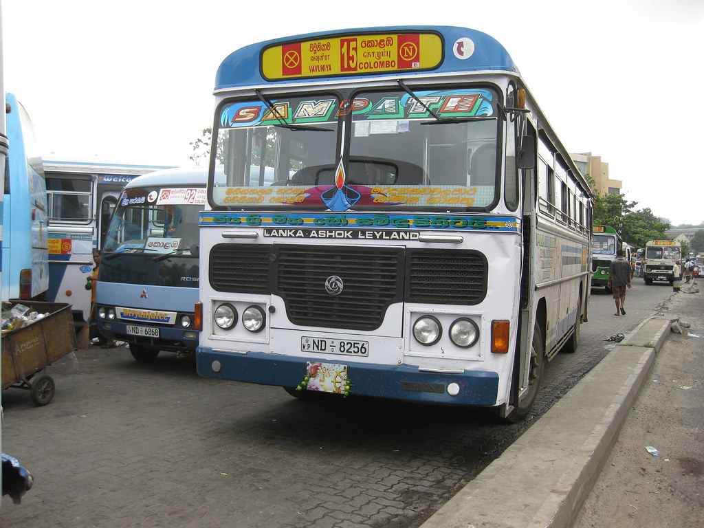 An intercity bus at a stand, route board for Vavuniya to Colombo